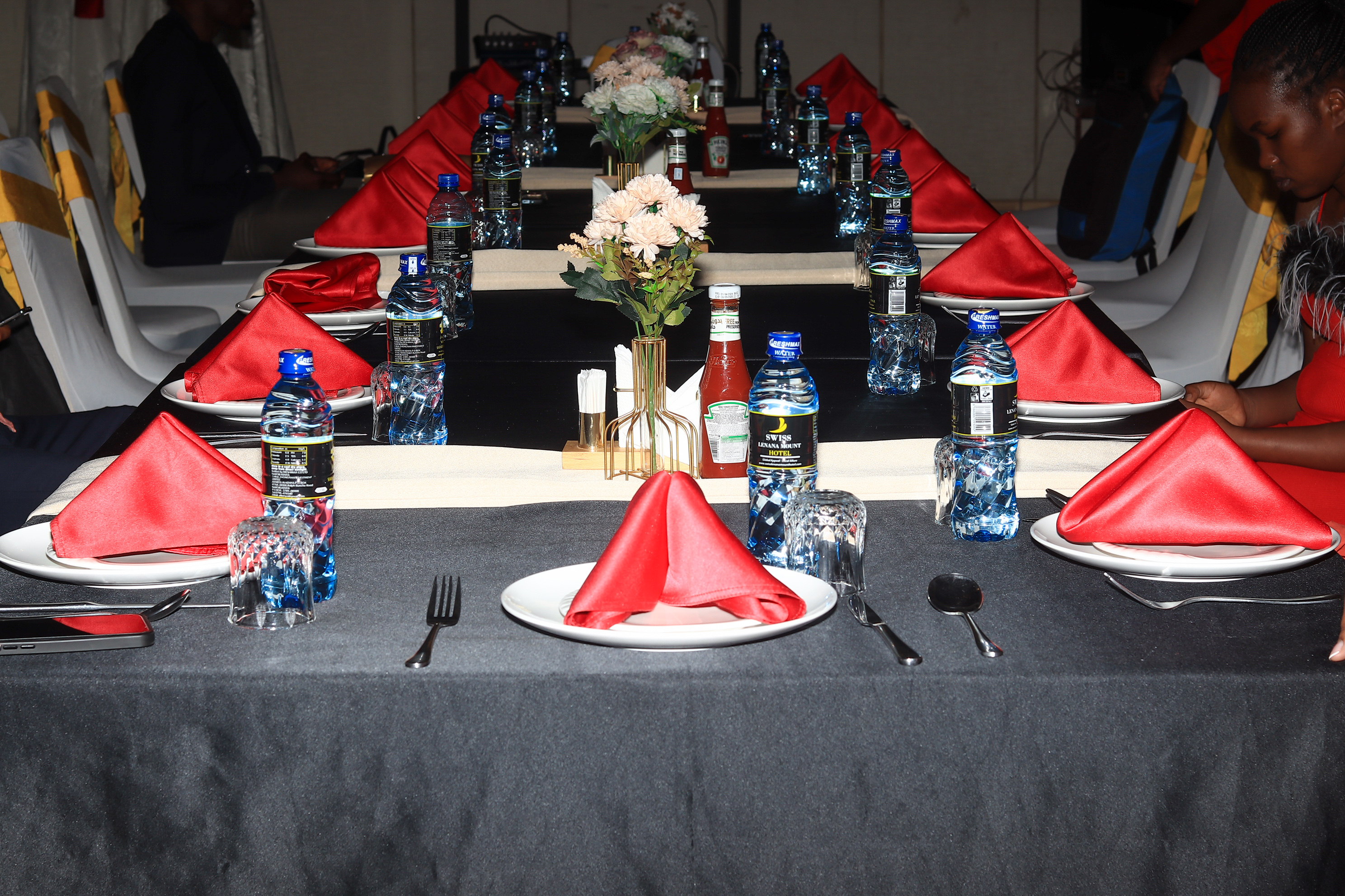 A surprise proposal moment with a man on one knee